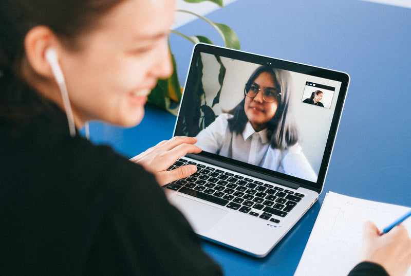 Student on a video call with a classmate.